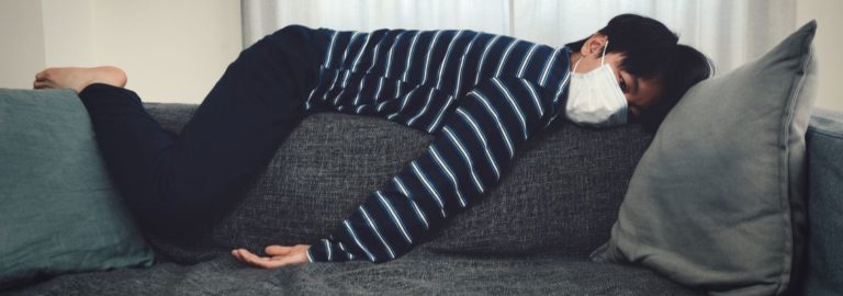 Man bored on couch