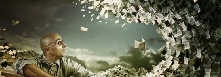 man scared pf wave of papers