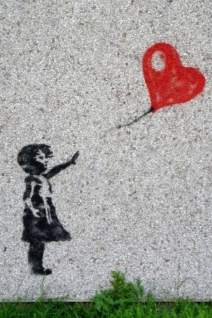 girl loosing her balloon